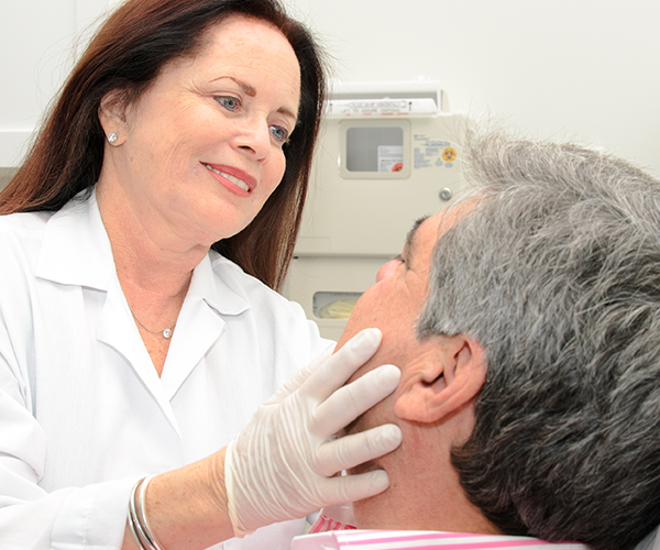 photo of doctor injecting Botox, Dysport & Xeomin